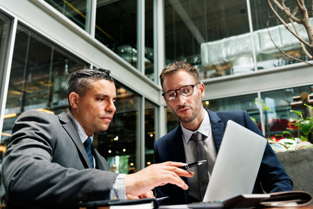 Businessmen Discussion Technology Outdoors Concept