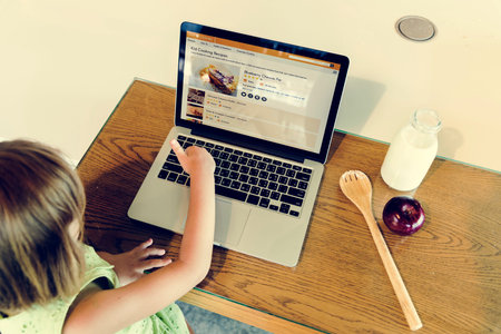Laptop Searching Bakery Pastry Recipe Concept