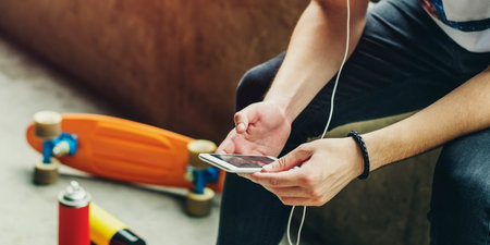 Skateboarding Sitting Relaxation Holiday Concept