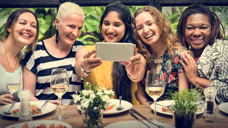Women Taking Pictures Device Concept