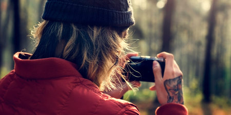Guy Taking Pictures Outdoors Concept