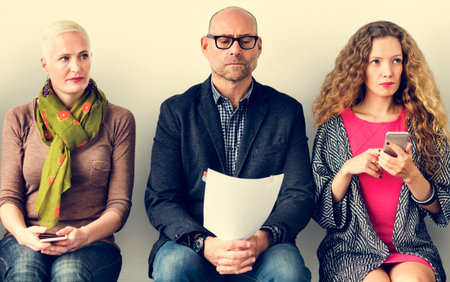 Diverse Group of People Community Sitting Waiting Concept