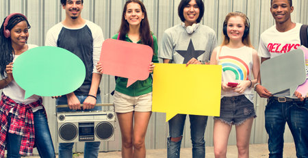 Diverse Group People Holding Speech Bubble Concept