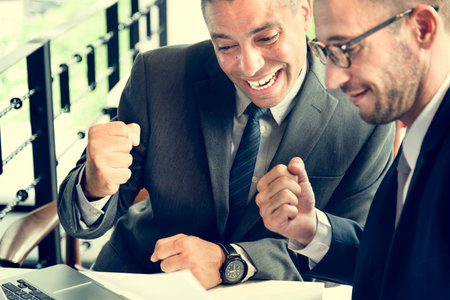 Two Business Men Celebrating Fist Concept