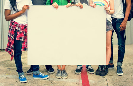 Diverse Group People Holding Blank Placard Concept