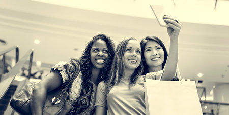 Group Of Women Taking Pictures Concept
