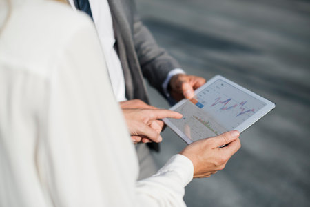 Businessmen Women Talk Hands Hold Tablet