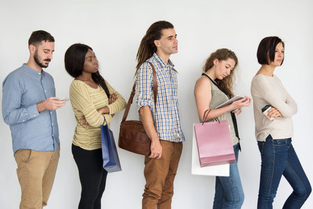 Diverse people queueing in line studio