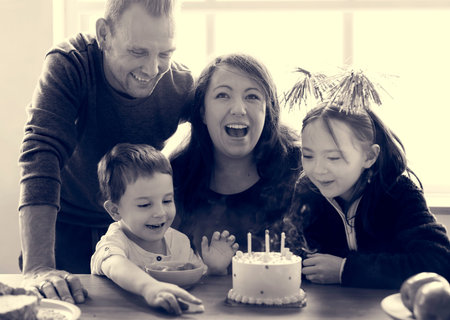 Family Celebrating Birthday Cake Smile Happy