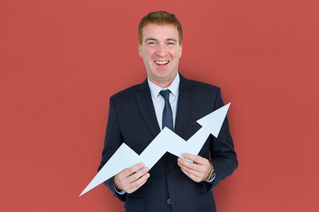 Caucasian Business Man Holding Growth Graph