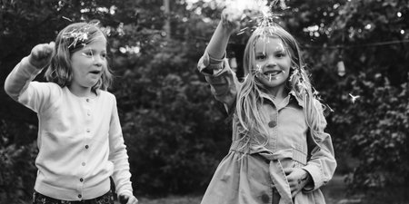 Small Girls Playing Outdoors Concept