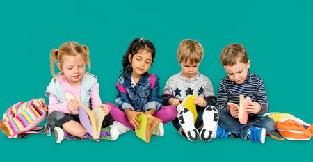 Little Children Reading Books Smiling