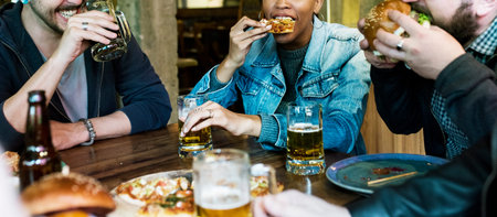 Diverse People Enjoy Food Drinks Party Restaurant