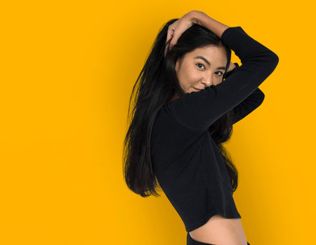 Young woman casual studio portriat in crop-top