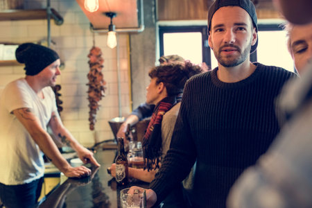 Diverse People Order Drinks Counter Pub