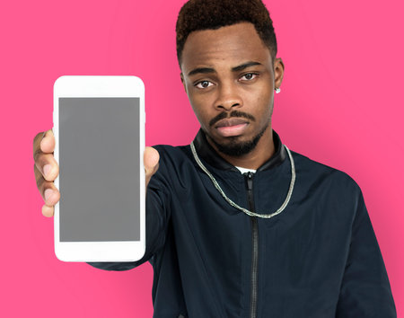 African Descent Man Holding Phone
