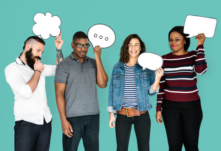 People Holding Chat Bubbles Smiling