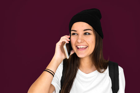 Woman talking mobile phone with smiling