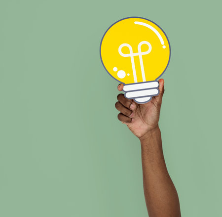Human Hand Holding Lightbulb Idea