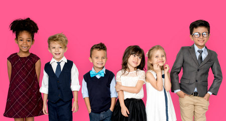Little Children Dressed Up Smiling