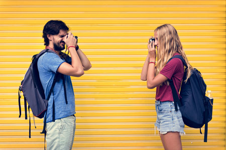 Couple taking photos of each other