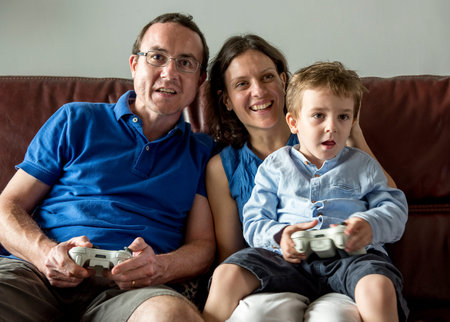 Family Playing Game on the Living Room Weekend Activity