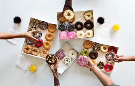 Diversity People Hands Reach for Doughnuts