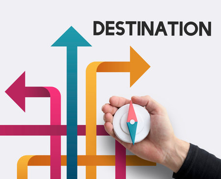 Hand holding compass navigation intersection path