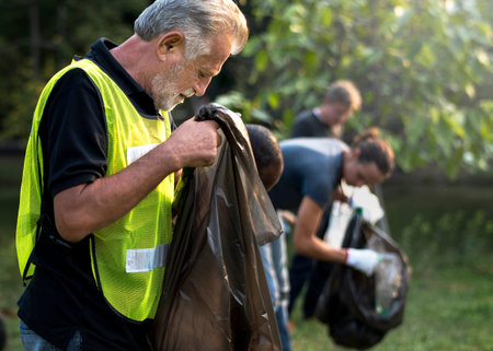 Ecology group of people cleaning the park