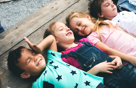 Diversity Group Of Kids Lying Smiling