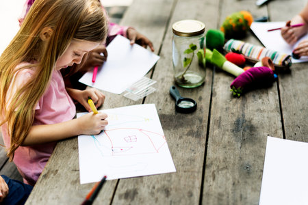 Group of children drawing imagination outdoors
