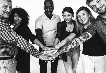 Diverse people are hands join together