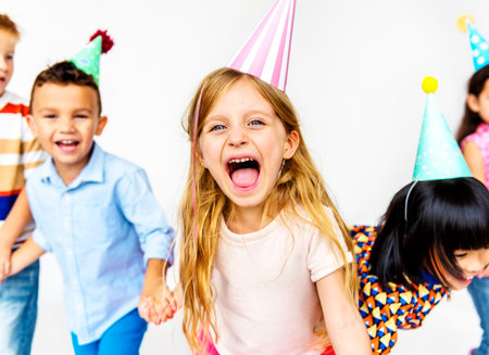 Group of kids celebrate party fun together