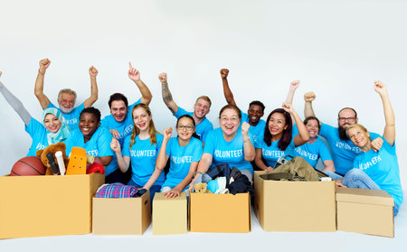 Group of volunteer people donate stuff for charity