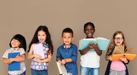 Group of Diverse Kids Reading Books Together Studio Portrait