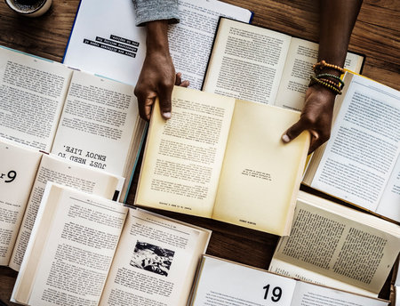 Human hand holding and reading book for research