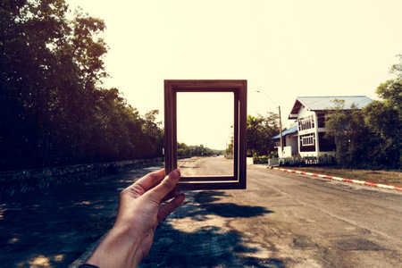 Hands Holding Photo Frame Outdoors Ideas
