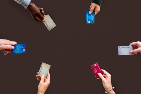 Group of hands holding credit card convenience life with copy space in aerial view