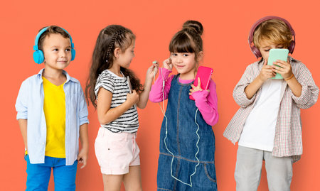 Happiness group of cute and adorable children listening music