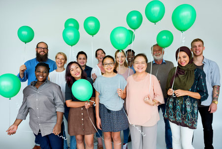 Diverse group of happiness people celebration with balloons