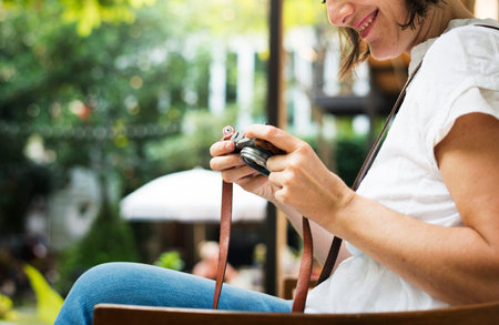 Woman traveler photographer holiday lifestyle trip