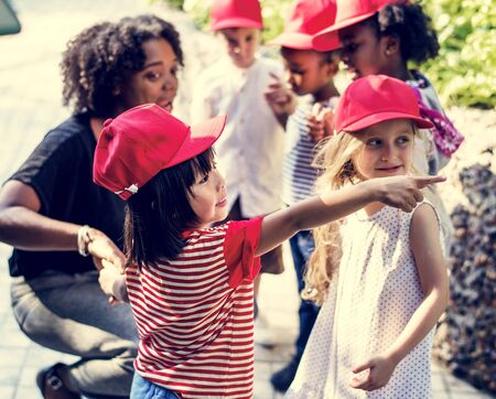 Teacher and kids school learning ecology gardening