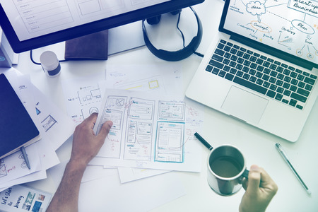 A Man Working Plan Diagram On A White Table