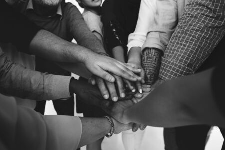 Group of people holding hand assemble togetherness