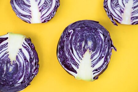 Purple cabbage on yellow background