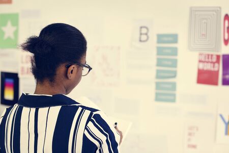 Startup Business People Looking on Strategy Board Information Thoughtful