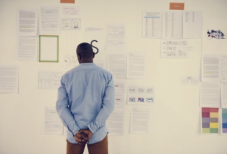 Startup Business People Looking on Strategy Board Information Thoughtful