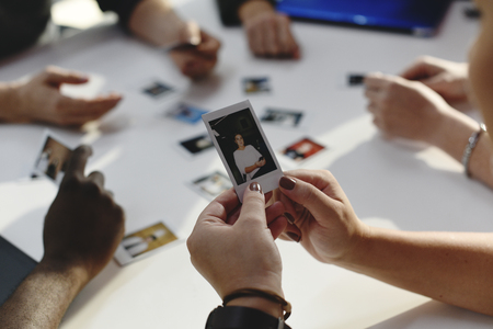People Looking Choosing at Colleagues Photo