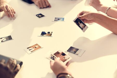 People Looking Choosing at Colleagues Photo