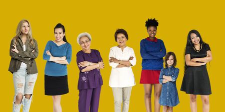 Generations of cheerful ladies standing in a row